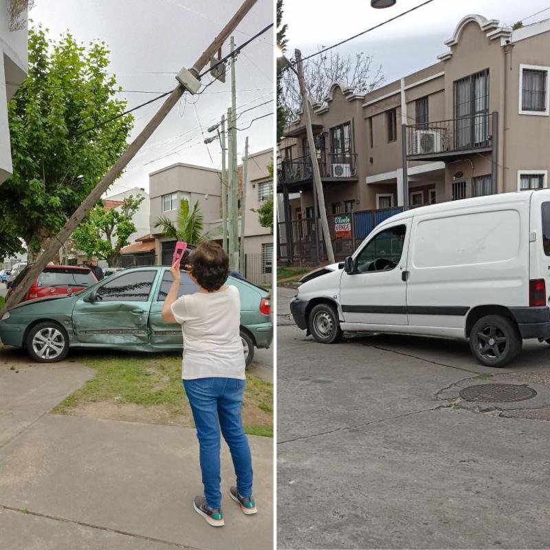 Un poste de luz al borde de la caída tras un violento choque